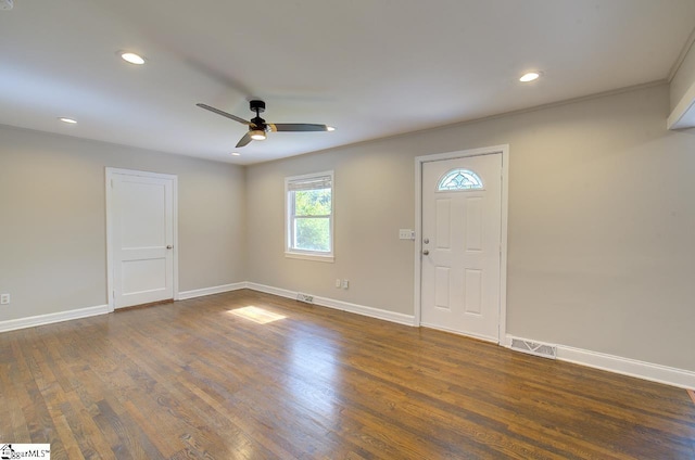 foyer featuring dark hardwood / wood-style floors and ceiling fan