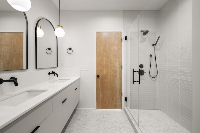 bathroom with vanity and an enclosed shower