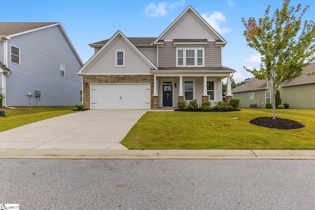 craftsman-style house with a garage, a porch, and a front lawn