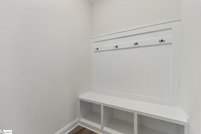 mudroom with dark hardwood / wood-style floors