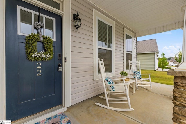 doorway to property with covered porch