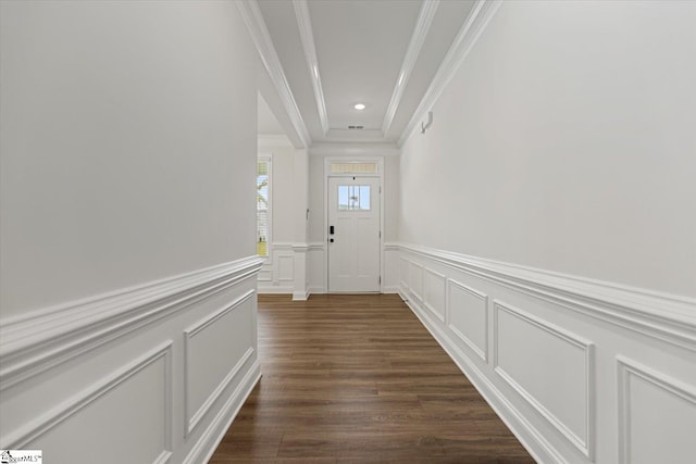 hall with crown molding and dark hardwood / wood-style flooring