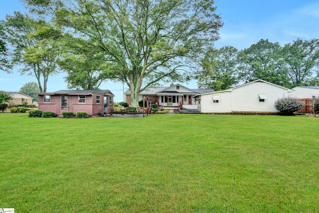 view of yard featuring a porch