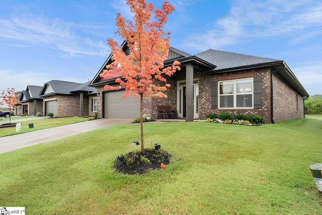 view of front facade with a garage and a front lawn