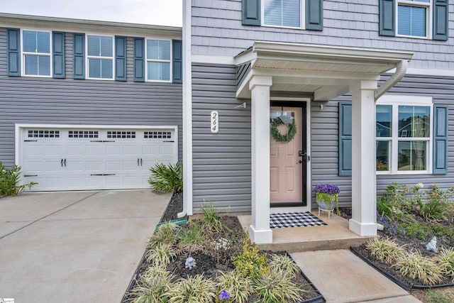 entrance to property featuring a garage