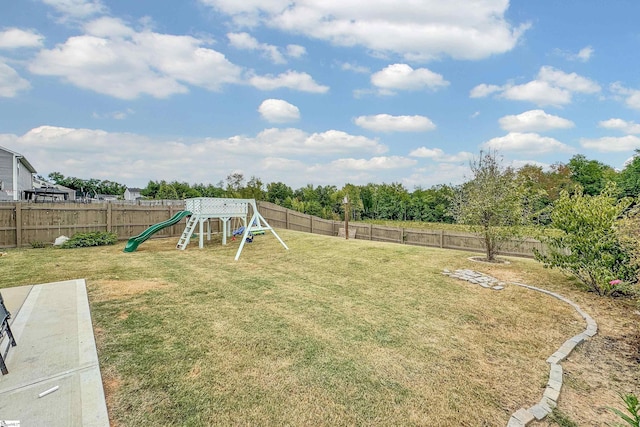 view of yard with a playground