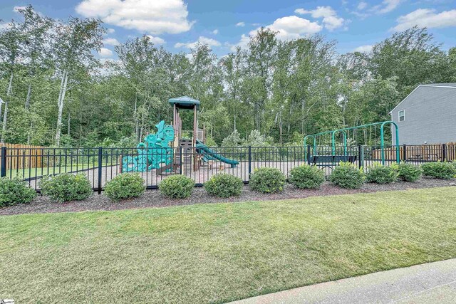 view of playground with a yard