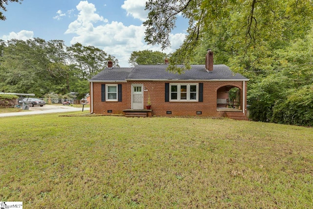 view of front of home with a front lawn