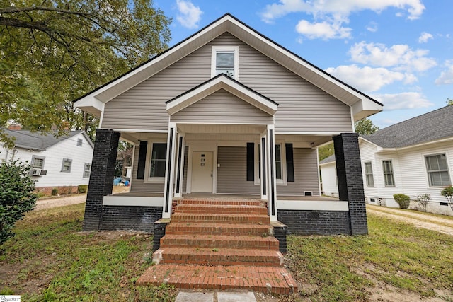 bungalow featuring covered porch