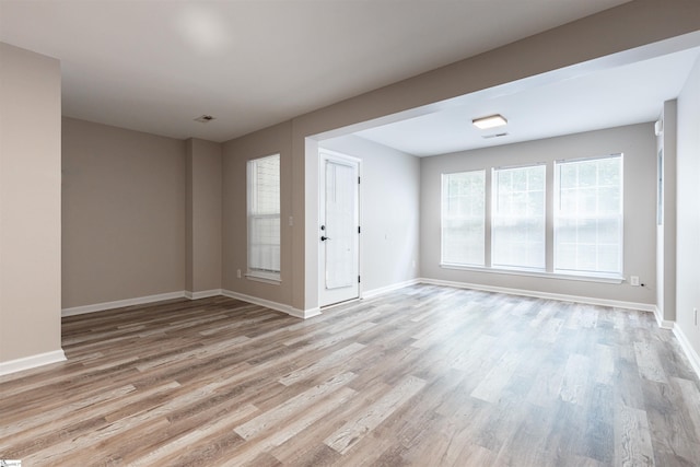 empty room featuring light hardwood / wood-style floors