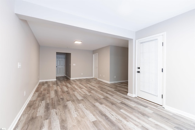 unfurnished room featuring light hardwood / wood-style floors