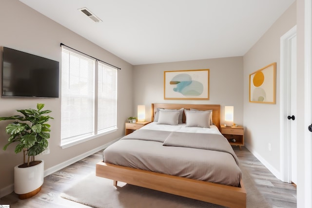 bedroom featuring light hardwood / wood-style flooring