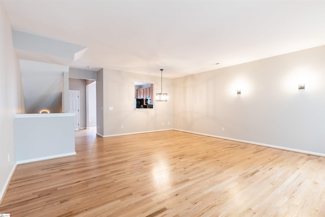 unfurnished living room with light hardwood / wood-style floors