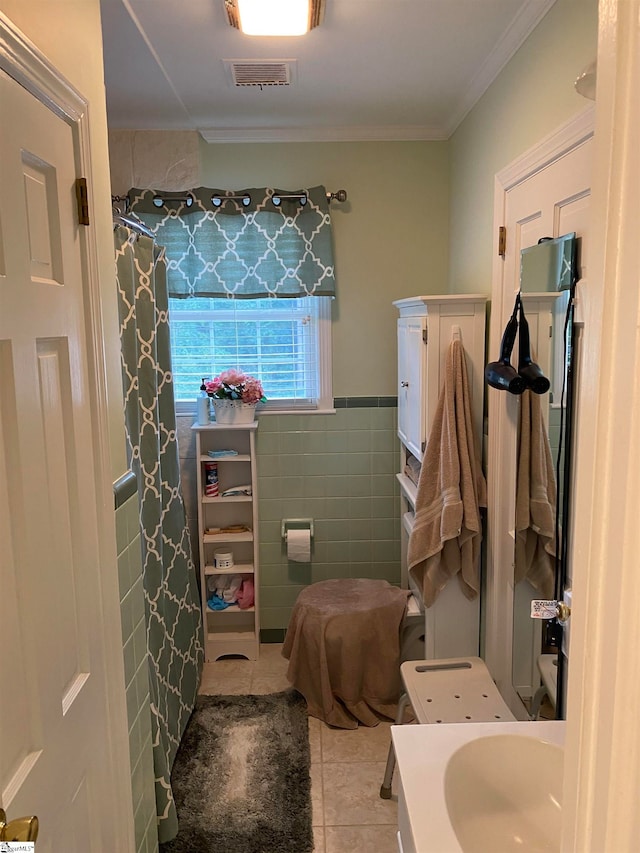 bathroom with tile walls, vanity, tile patterned flooring, toilet, and a shower with curtain