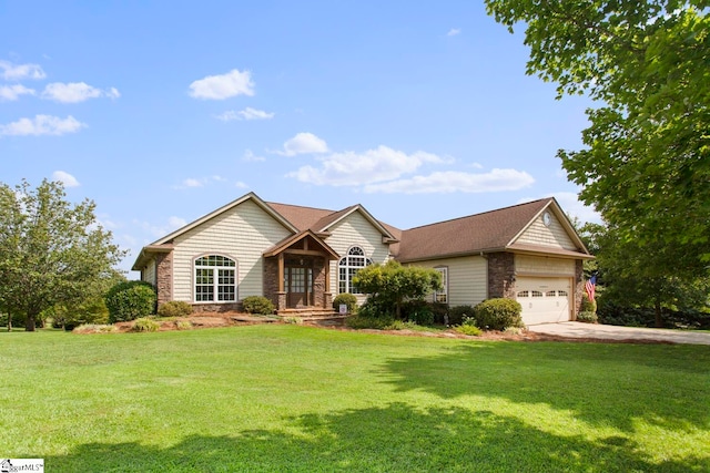 view of front facade featuring a garage and a front lawn