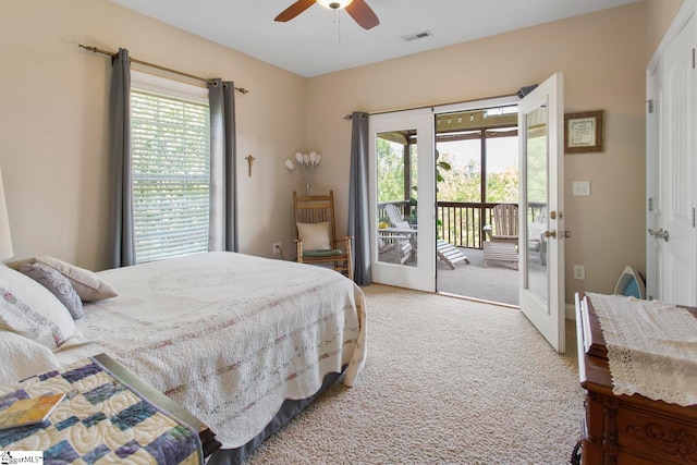 carpeted bedroom featuring access to outside, ceiling fan, and french doors