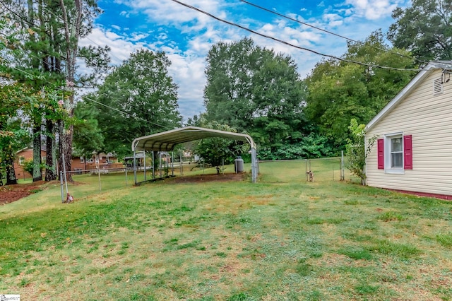 view of yard with a carport