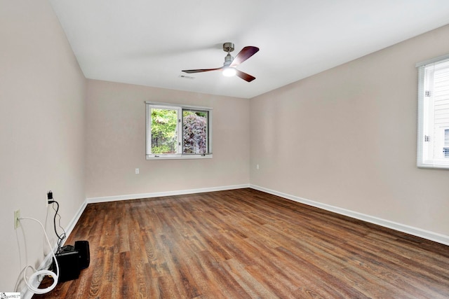 empty room featuring ceiling fan and wood-type flooring