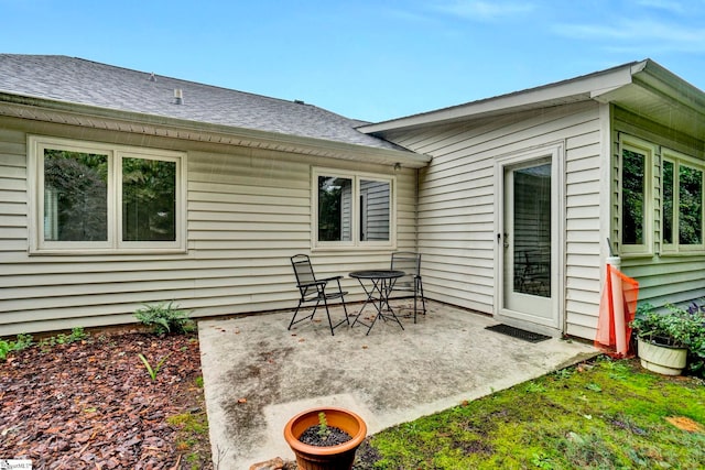 back of house featuring a patio