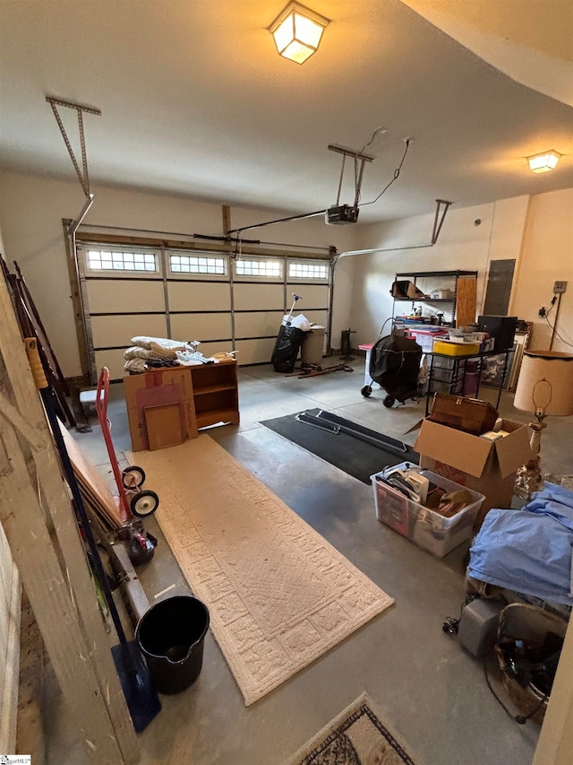 garage featuring a garage door opener