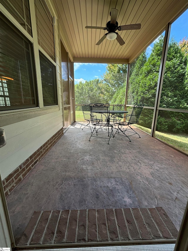 view of patio featuring ceiling fan