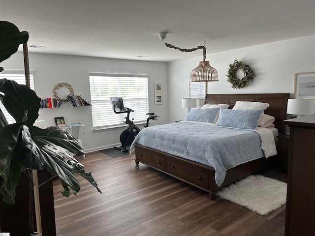 bedroom featuring dark wood-type flooring