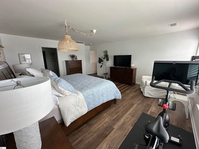 bedroom featuring dark wood-type flooring