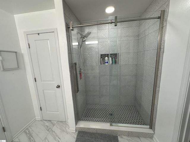 bathroom featuring an enclosed shower