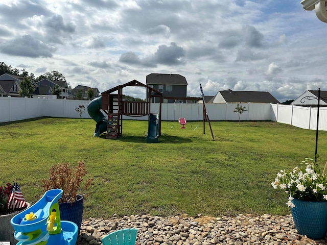 view of yard with a playground