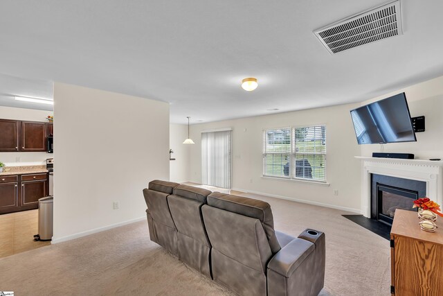 living room with light colored carpet