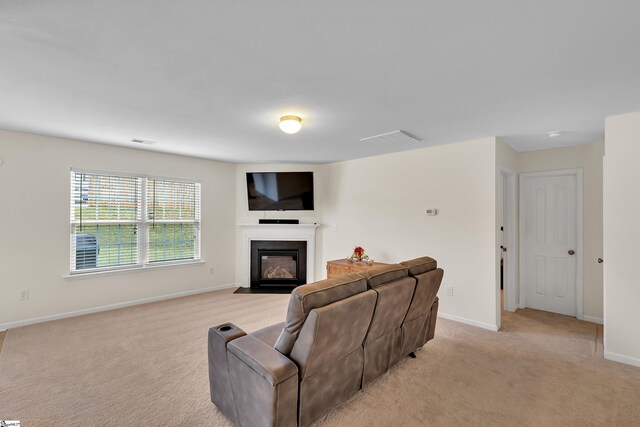 living room featuring light carpet