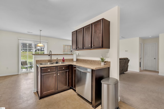 kitchen with hanging light fixtures, dishwasher, dark brown cabinets, sink, and light colored carpet