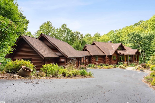 view of log cabin