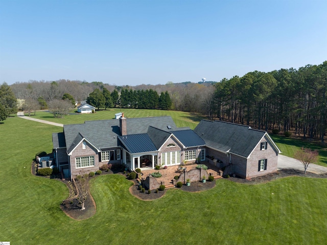 exterior space featuring a front lawn