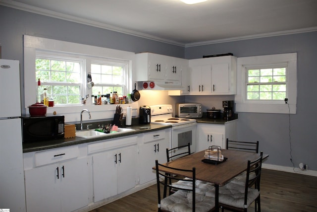 kitchen featuring crown molding, dark wood-type flooring, white appliances, and white cabinetry