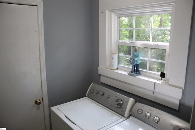 laundry area with washing machine and dryer