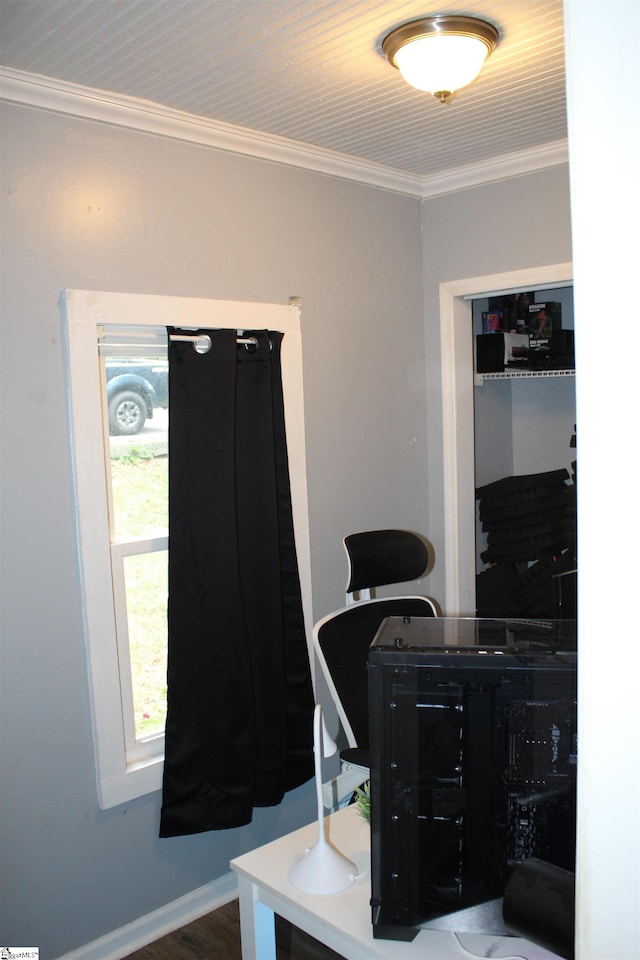 home office featuring wood-type flooring and ornamental molding