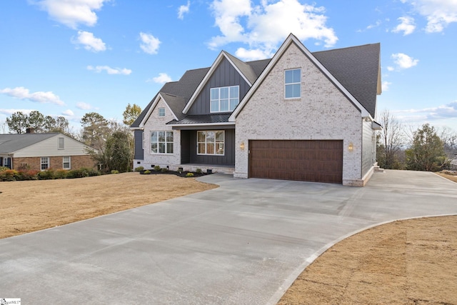 craftsman-style house featuring a garage and a front lawn