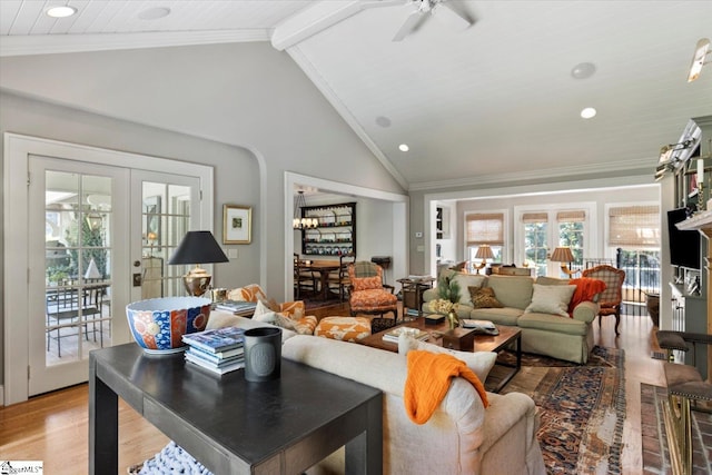 living room with ceiling fan, beamed ceiling, french doors, high vaulted ceiling, and light wood-type flooring