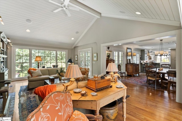 living room with wood ceiling, hardwood / wood-style floors, ceiling fan, and high vaulted ceiling