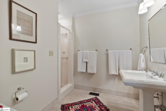 bathroom featuring tile patterned flooring, ornamental molding, and a shower with shower curtain