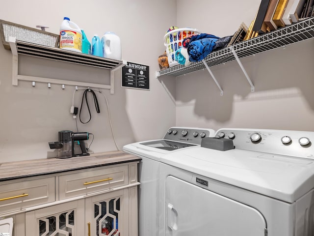 laundry room featuring separate washer and dryer