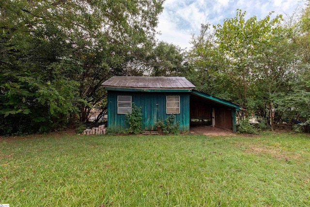 view of outdoor structure featuring a yard