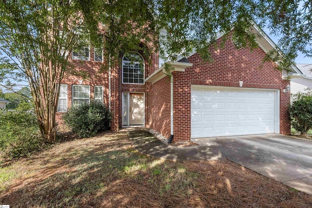 front facade with a garage