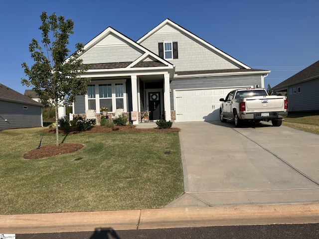 craftsman inspired home with a front yard