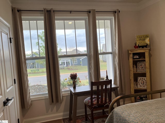 bedroom featuring crown molding