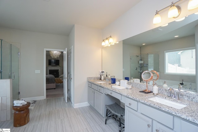 bathroom with vanity and separate shower and tub