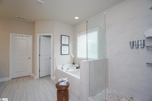 bathroom with plus walk in shower