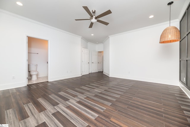 unfurnished living room with ceiling fan, crown molding, and dark hardwood / wood-style flooring