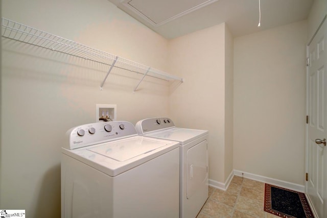 clothes washing area featuring independent washer and dryer